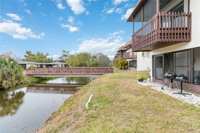 view of yard with a water view