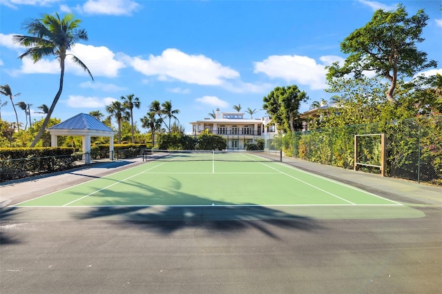 16475 Captiva Dr, Captiva, FL 33924 - view of tennis court featuring community basketball court