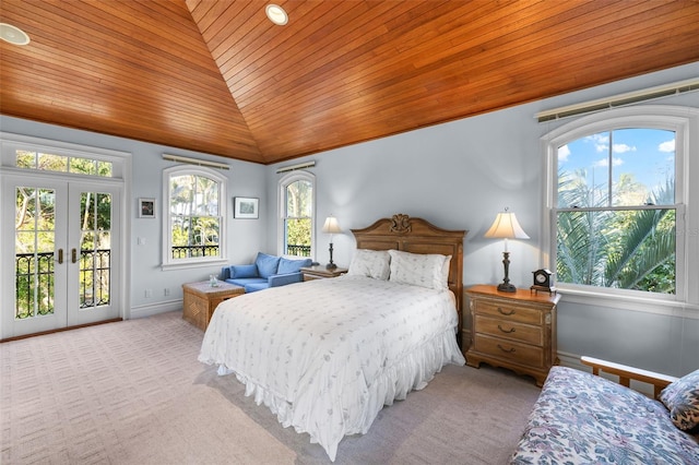 16475 Captiva Dr, Captiva, FL 33924 - bedroom featuring wood ceiling, access to outside, lofted ceiling, multiple windows, and light carpet