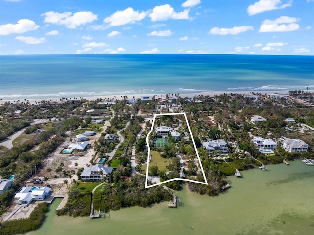 16475 Captiva Dr, Captiva, FL 33924 - aerial view of property and surrounding area with extended coastline, nearby suburban area, and property boundaries highlighted