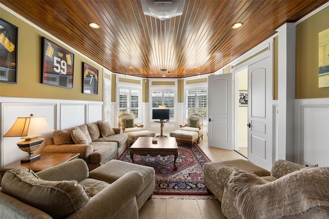 16475 Captiva Dr, Captiva, FL 33924 - living room featuring wood ceiling, a decorative wall, ornamental molding, wainscoting, and recessed lighting