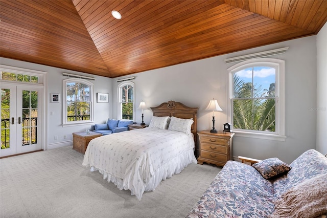 16475 Captiva Dr, Captiva, FL 33924 - carpeted bedroom featuring wood ceiling, lofted ceiling, access to exterior, french doors, and baseboards