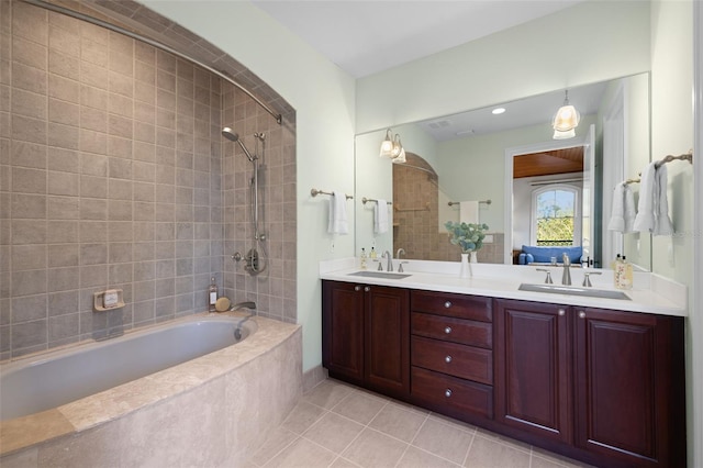 16475 Captiva Dr, Captiva, FL 33924 - bathroom featuring tile patterned floors, double vanity, and tiled shower / bath