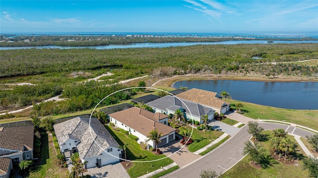 birds eye view of property featuring a water view