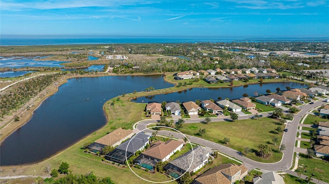 aerial view featuring a water view