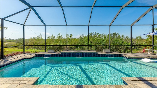 view of pool featuring a lanai and pool water feature