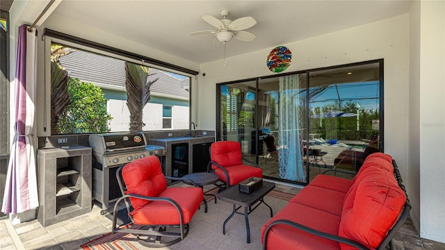 sunroom / solarium with wine cooler, ceiling fan, and sink