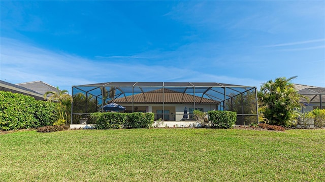 view of yard featuring glass enclosure