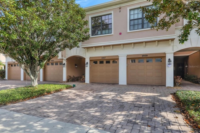 view of front of home with a garage