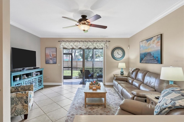 living room with crown molding, ceiling fan, and light tile patterned floors