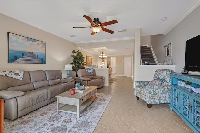 tiled living room with crown molding and ceiling fan with notable chandelier