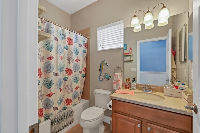 full bathroom featuring vanity, toilet, and shower / bath combo with shower curtain