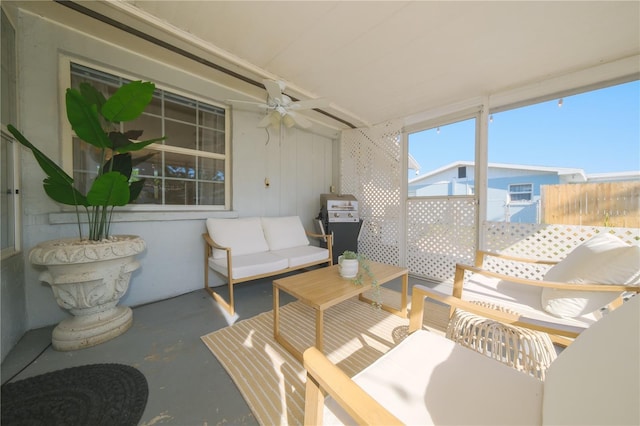 sunroom / solarium with ceiling fan