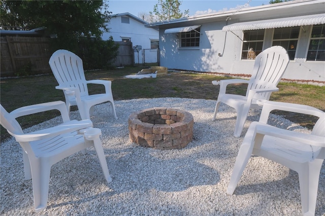 view of patio with an outdoor fire pit