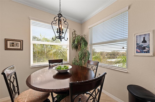 tiled dining room with crown molding and a chandelier