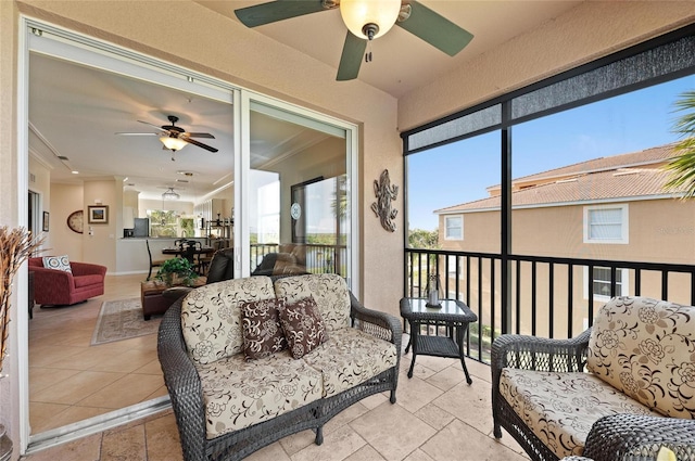 sunroom / solarium with ceiling fan