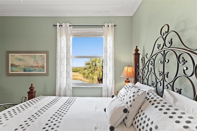 bedroom featuring crown molding