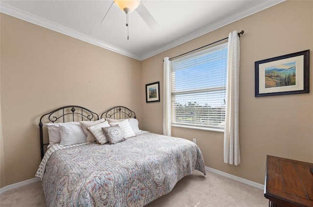 bedroom with light carpet, crown molding, and ceiling fan