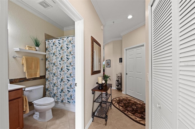 full bathroom featuring tile patterned flooring, crown molding, and toilet