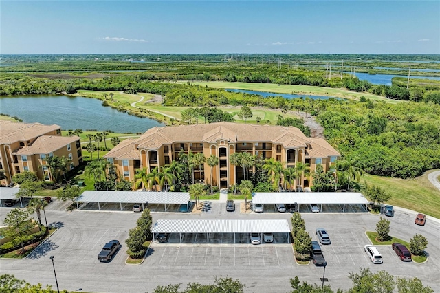 drone / aerial view with a water view