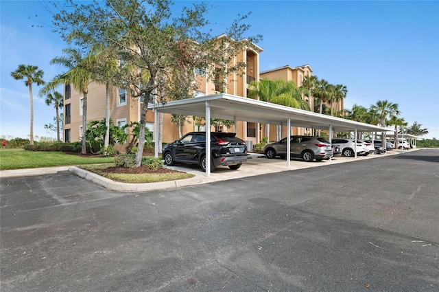 view of car parking featuring a carport