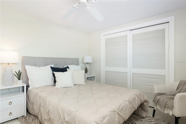 bedroom with ceiling fan and a closet