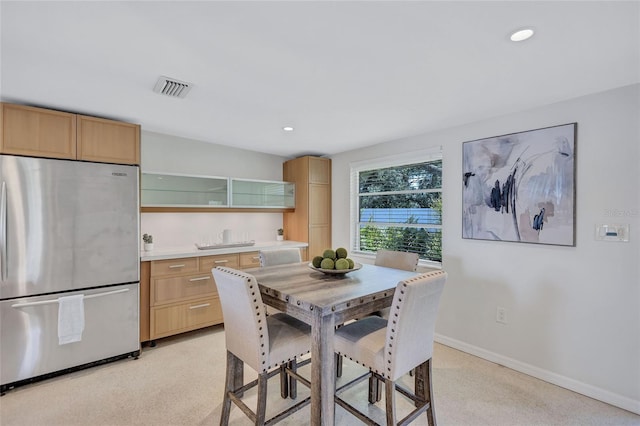 2321 Terry Ln, Sarasota, FL 34231 - dining space featuring baseboards, light carpet, and recessed lighting