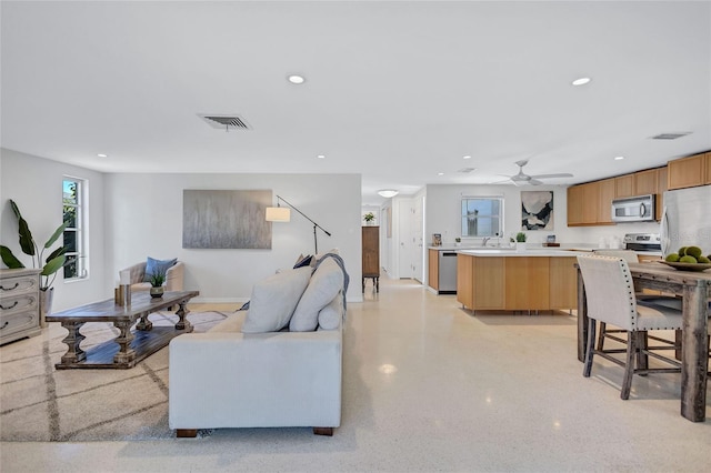 2321 Terry Ln, Sarasota, FL 34231 - living area with recessed lighting, a ceiling fan, and baseboards