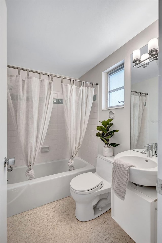 2321 Terry Ln, Sarasota, FL 34231 - full bathroom with speckle patterned floor, toilet, shower / tub combo with curtain, and vanity