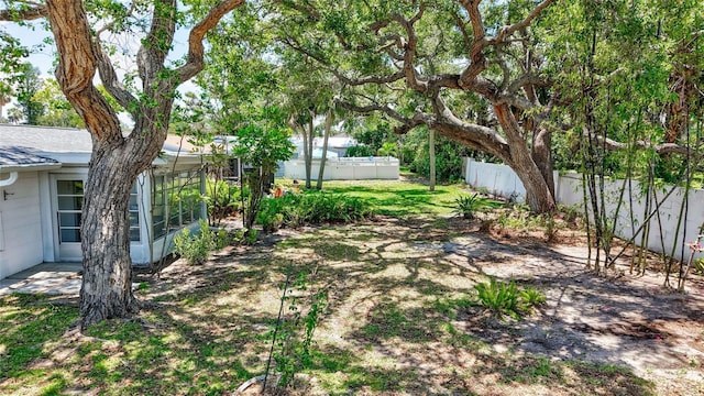 2321 Terry Ln, Sarasota, FL 34231 - view of yard featuring a sunroom