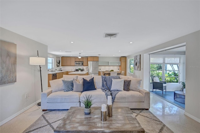 2321 Terry Ln, Sarasota, FL 34231 - living area with baseboards, recessed lighting, and ceiling fan