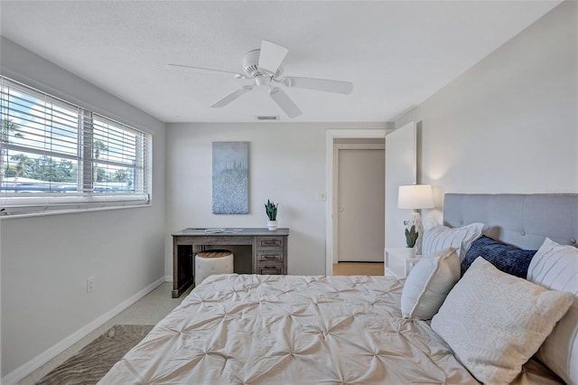 2321 Terry Ln, Sarasota, FL 34231 - carpeted bedroom with baseboards and ceiling fan