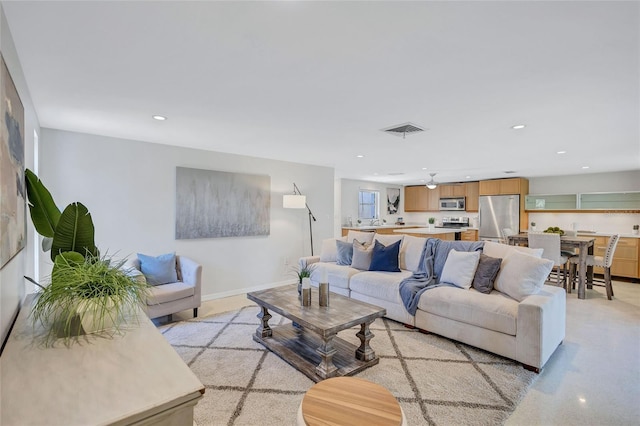 2321 Terry Ln, Sarasota, FL 34231 - living area with recessed lighting and baseboards