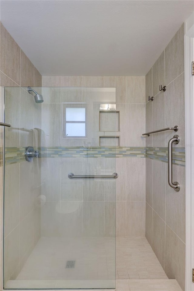 2321 Terry Ln, Sarasota, FL 34231 - full bathroom featuring a stall shower