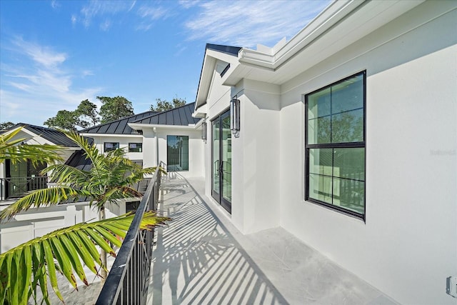 view of home's exterior with a balcony