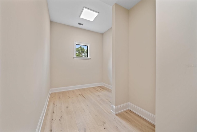 656 Tropical Cir, Sarasota, FL 34242 - spare room featuring baseboards, light wood-style flooring, and visible vents