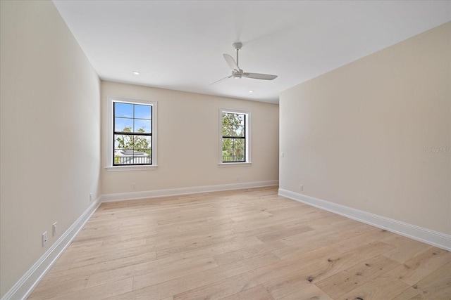 656 Tropical Cir, Sarasota, FL 34242 - unfurnished room featuring a ceiling fan, baseboards, recessed lighting, and light wood-type flooring