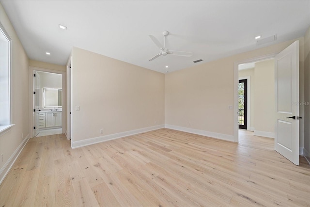 656 Tropical Cir, Sarasota, FL 34242 - unfurnished room with a ceiling fan, baseboards, visible vents, and light wood-style flooring