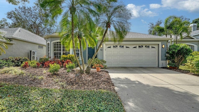 single story home with a garage