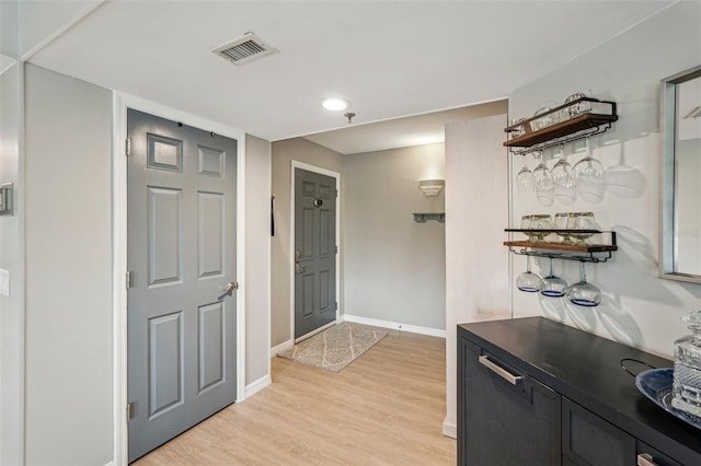 interior space with light hardwood / wood-style floors