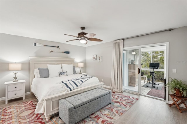 bedroom with access to outside, ceiling fan, and light hardwood / wood-style flooring