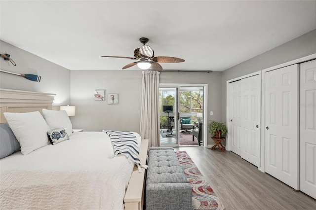 bedroom with multiple closets, ceiling fan, access to outside, and light wood-type flooring