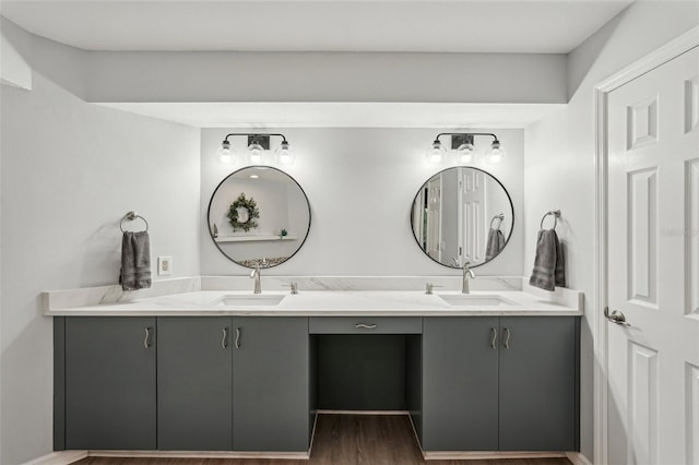 bathroom with hardwood / wood-style flooring and vanity