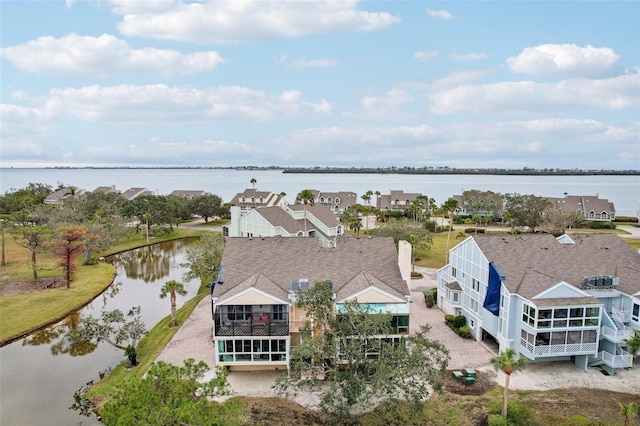 drone / aerial view with a water view