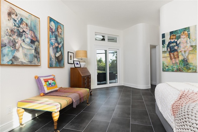 tiled bedroom featuring access to exterior