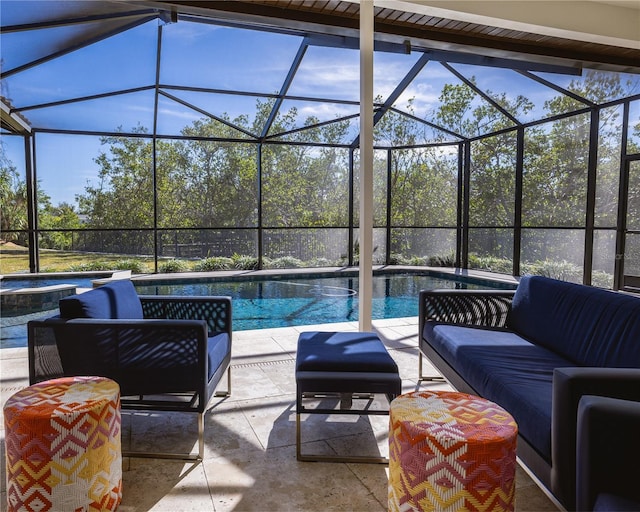 view of swimming pool with an outdoor hangout area, a patio area, and glass enclosure