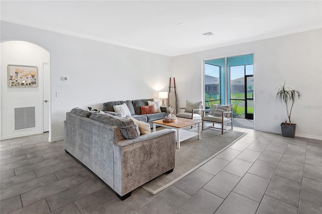 living room featuring crown molding