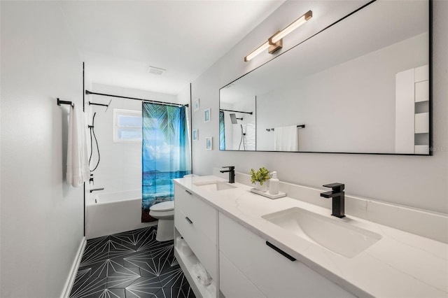 full bathroom with vanity, toilet, and tiled shower / bath combo