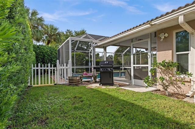 view of yard with a lanai