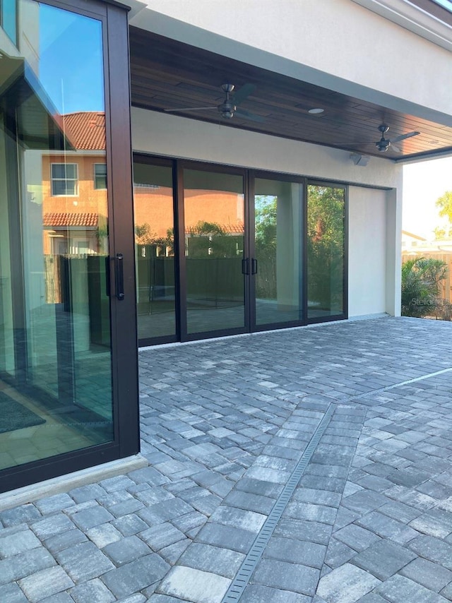 view of patio with ceiling fan